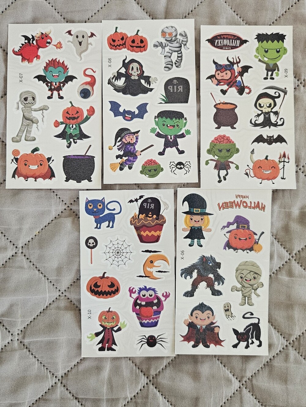 Halloween themed temporary tattoos. 5 sheets in total. Pumpkins, Frankenstein,